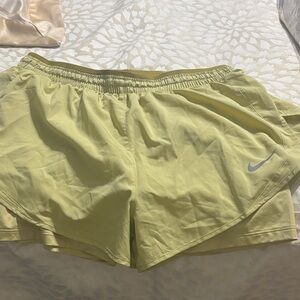 Nike Women's Soft Yellow Athletic Shorts